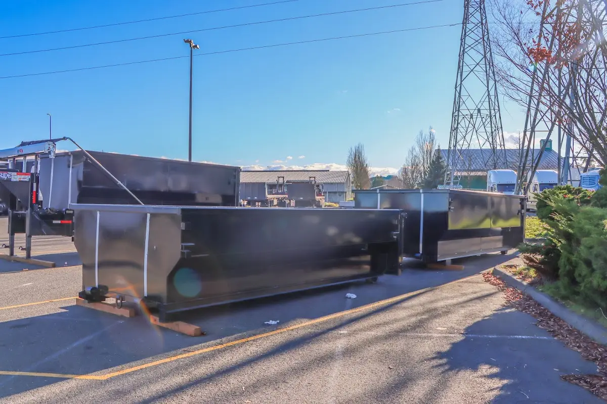 Roll-off dumpster ready for waste disposal at job site for 2 Yard Dumpster Rental in Mexia